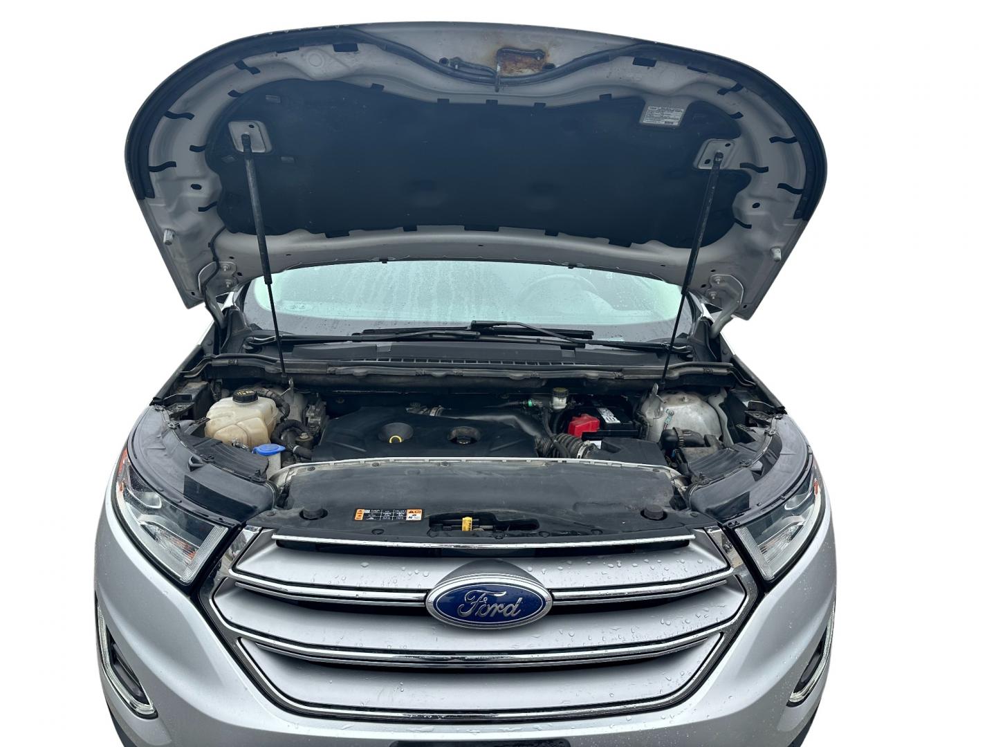 2017 Silver /Black Ford Edge Titanium (2FMPK4K92HB) with an 2.0L I4 DOHC 16V Turbo engine, 6-Speed Automatic transmission, located at 547 E. Main St., Orwell, OH, 44076, (440) 437-5893, 41.535435, -80.847855 - This 2017 Ford Edge Titanium AWD is a well-equipped midsize SUV. It comes with a powerful yet efficient 2.0L EcoBoost engine paired with a smooth 6-speed automatic transmission. Notable features include LED daytime running lights, dusk-sensing headlights, leather interior, auto-dimming rearview mirr - Photo#13